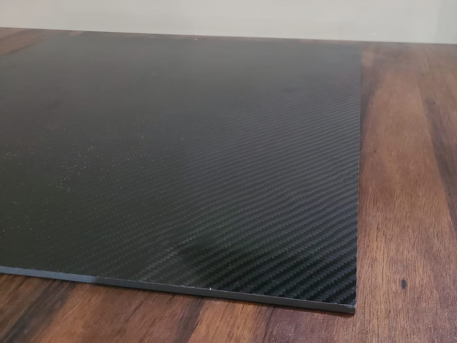 Solid carbon fibre laminate
